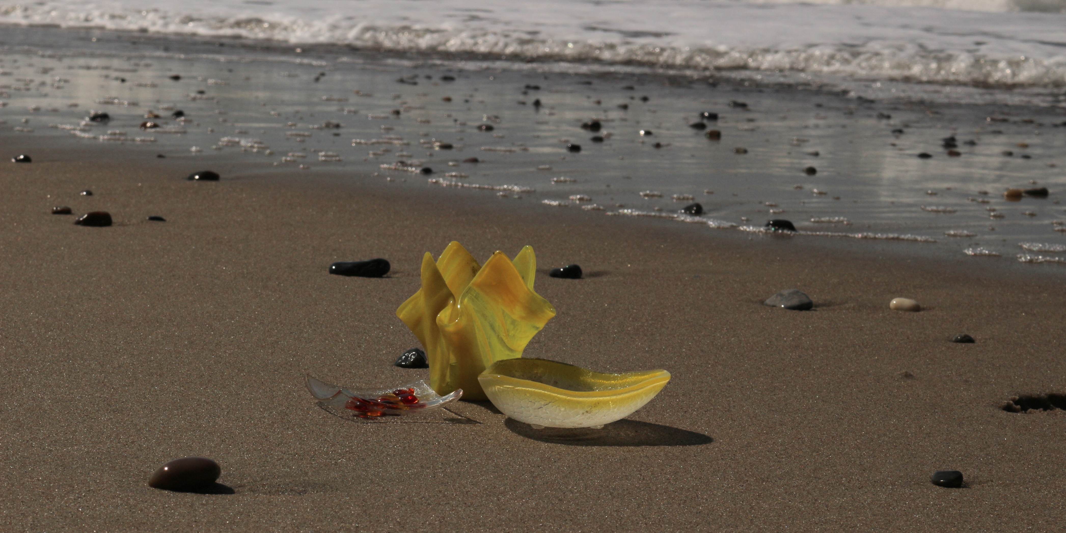 Lysestager på strand